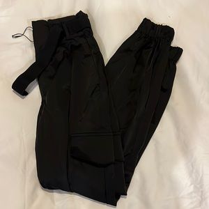 Black satin cargo trousers